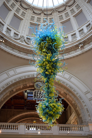 LONDON, ENGLAND - May 24,2017: hanging glass sculpture by Dale Chihuly in the foyer and atrium in the Victoria and Albert Museum, main entrance, London, UKのeditorial素材