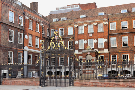 LONDON, ENGLAND - May 24,2017: decorative forged gates and main facade of the College of Arms, also known as the College of Heralds in London, UKのeditorial素材
