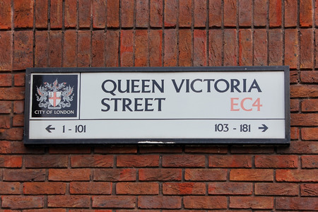 queen victoria street, street plate on a wall of old brick house in London, City of London, UKのeditorial素材