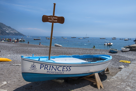 Positano, Italy - may 24, 2017: scenic view of beach in Positano with a beautiful boat in the foreground, Amalfi Coast, Campania region in Italyのeditorial素材