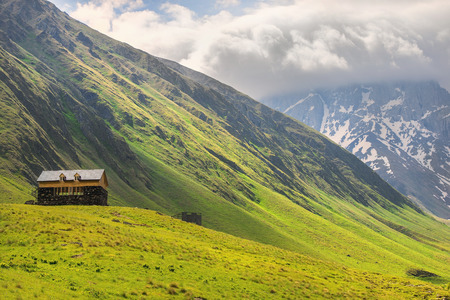 picturesque mountain landscape, Caucasus mountain range, Juta valley, Kazbegi region, Georgiaの写真素材
