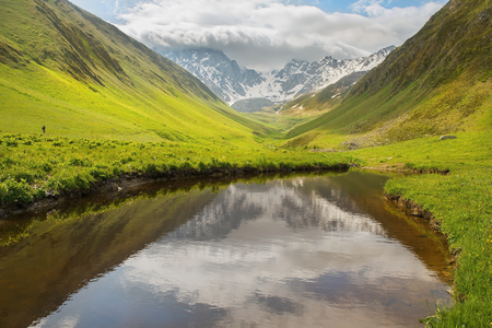 picturesque mountain landscape, Caucasus mountain range, Juta valley, Kazbegi region, Georgiaの写真素材