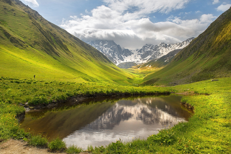 picturesque mountain landscape, Caucasus mountain range, Juta valley, Kazbegi region, Georgiaの写真素材