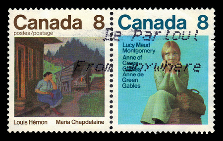 CANADA - CIRCA 1975: A stamp printed in Canada shows illustrations for books: "Anne of Green Gables" by Lucy Maud Montgomery and "Maria Chapdelaine" by Louis Hemon, series canadian writers, circa 1975のeditorial素材