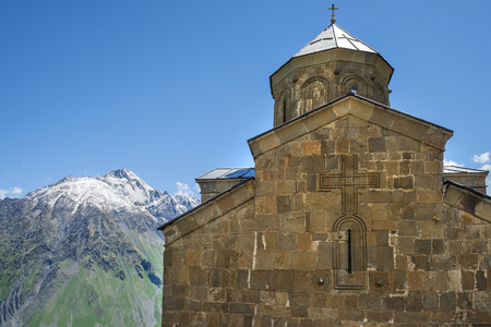 Gergeti Trinity Church (Tsminda Sameba), Holy Trinity Church near the village of Gergeti in Georgia, under Mount Kazbegiの写真素材
