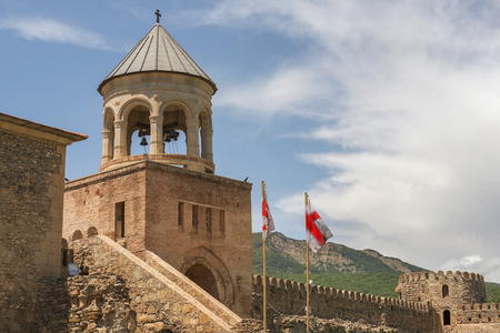 bell-tower of Svetitskhoveli Cathedral (Cathedral of the Living Pillar) is Georgian Orthodox cathedral located in the historical town of Mtskheta, Georgiaの写真素材