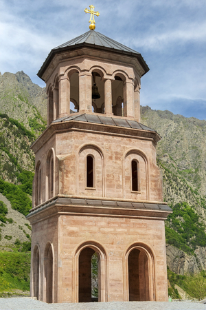 bell-tower of monastery of the Holy Archangels Michael and Gabriel in the Daryal gorge in Georgiaの写真素材