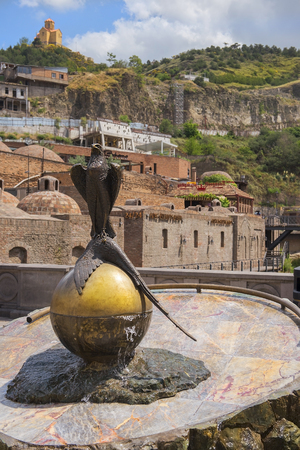 Abanotubani, ancient district of old Tbilisi, Georgia, known for its sulfuric baths and  monument falcon with pheasantのeditorial素材