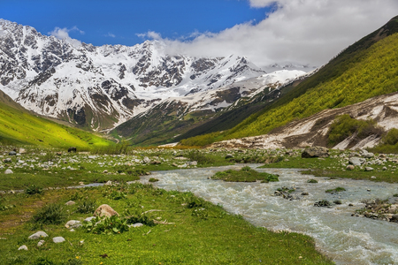 rough mountain stream in the mountains of Upper Svaneti, Greater Caucasus Mountain Range in Georgiaの写真素材