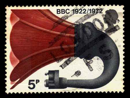 UNITED KINGDOM - CIRCA 1972: A stamp printed in Great Britain shows horn loudspeaker, 50th anniversary of daily broadcasting by the BBC, circa 1972のeditorial素材