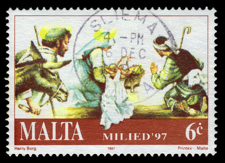 Malta - CIRCA 1997: A stamp printed in Malta shows Mary and baby Jesus, adoration of the Magi, Christmas (1997), circa 1997のeditorial素材