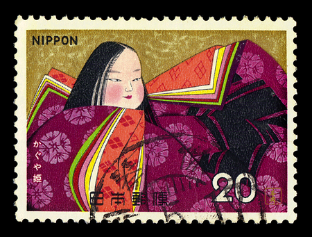 JAPAN - CIRCA 1974: A stamp printed in Japan shows moon princess in the tale of the Bamboo Cutter, series "Folk Tale" 4th issue Kaguya hime, circa 1974のeditorial素材