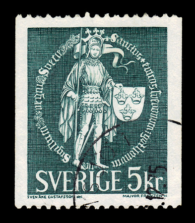 SWEDEN - CIRCA 1970: a stamp printed in the Sweden shows Jester, man of motley in the armor of a medieval knight, circa 1970のeditorial素材