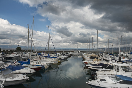 MONTREUX, SWITZERLAND - September 02: yacht parking on Montreux Riviera at Lake Geneva in the early morning on a cloudy day, Montreux, Switzerland on September 02, 2017のeditorial素材