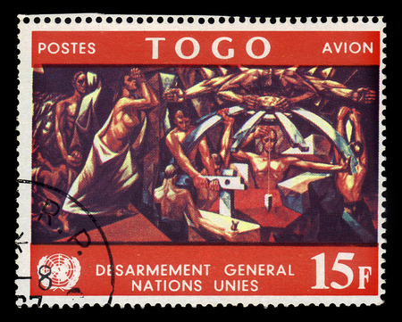 TOGO - CIRCA 1967: A stamp printed in Togo shows mural by spanish artist Jose Vela Zanetti in United Nations Conference Building, circa 1967のeditorial素材