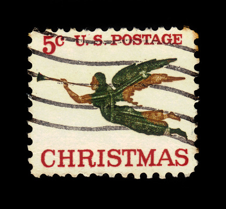 United States - CIRCA 1965: A stamp printed in the United States shows Angel with Trumpet, Christmas 1965, circa 1965のeditorial素材
