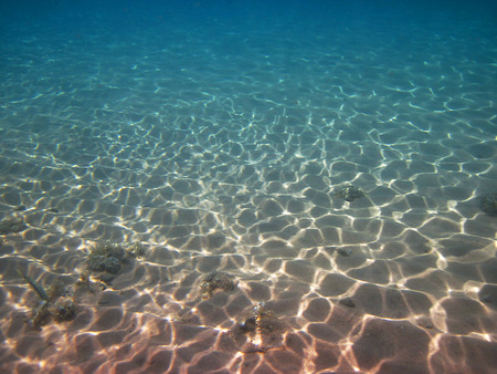 sunlight illuminated the bottom of the sea as marine background, Red Sea, Eilat, Israelの写真素材