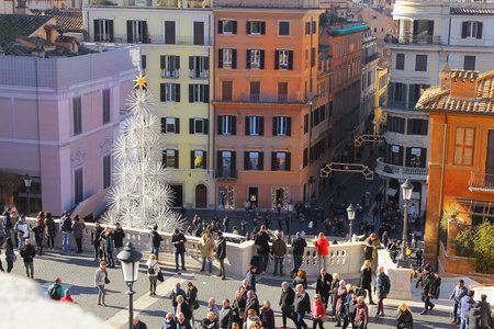 ROME, ITALY: January 01, 2017 : unusual Christmas tree and tourists are walking on the Spanish...