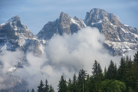 view of the steep mountain slopes covered with snow in the Swiss Alpsの写真素材