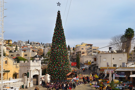 NAZARETH, ISRAEL - DECEMBER 18: People celebrate the Christmas, near the Greek Orthodox Church of the Annunciation in Nazareth, Israel, december 18, 2017のeditorial素材