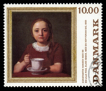 DENMARK - CIRCA 1989: A stamp printed in Denmark shows a painting "a little girl Elise Kobke with cup" by danish painter Constantin Hansen, circa 1989のeditorial素材