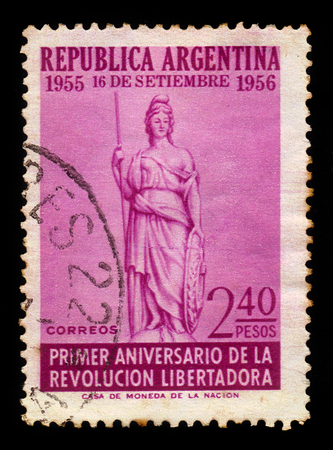 ARGENTINA - CIRCA 1956: a stamp printed in the Argentina shows allegorical image of Liberty, 1st Anniversary of the Revolution of Liberation, circa 1956のeditorial素材