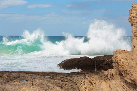 sea waves crashing against the rocks, Tantura nature reserve, northern Israelの写真素材
