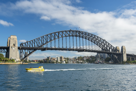 Sydney, Australia - March 24, 2018: Sydney Harbour Bridge and cityscape with pleasure boat in Sydney harbourのeditorial素材