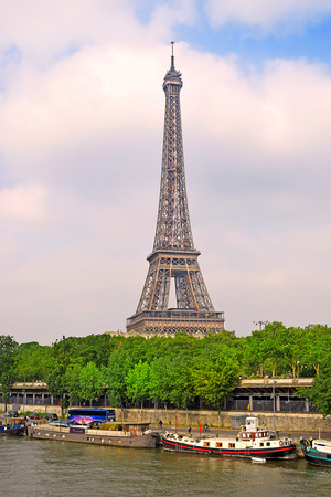 view of the Eiffel Tower from the river Seine in Paris, Eiffel Tower most visited monument in France and the most famous symbol of Parisのeditorial素材