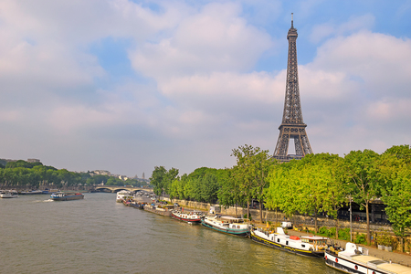 view of the Eiffel Tower from the river Seine in Paris, Eiffel Tower most visited monument in France and the most famous symbol of Parisのeditorial素材