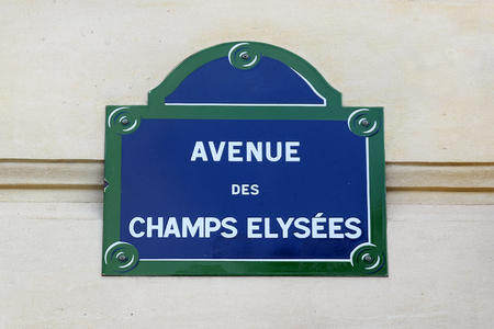 Avenue des Champs-Elysees, street plate on a wall of house in the 8th arrondissement of Paris, capital of Franceの写真素材