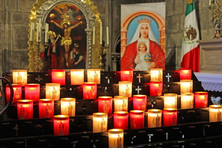 burning memorial candles at Notre Dame de Paris Cathedral in Paris, Franceのeditorial素材