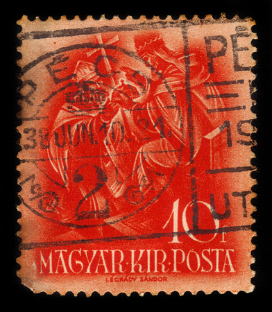 HUNGARY - CIRCA 1938 : a stamp printed in Hungary shows Archbishop Asztrik receives the crown from the pope, series 900th anniv. of the death of St. Stephen, circa 1938のeditorial素材