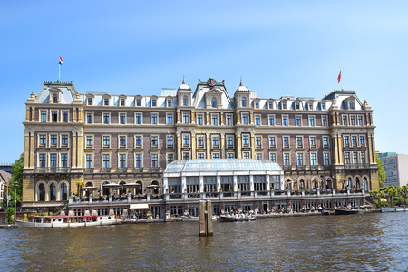 Amsterdam, the Netherlands - May 20, 2018: the famous five star Amstel hotel at the bank of the Amstel river, The Amstel Hotel is part of the InterContinental Hotels chainのeditorial素材