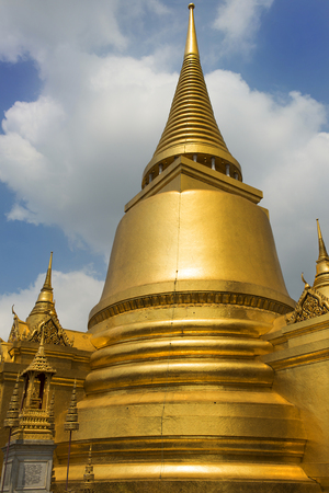 Golden Pagoda Thai Stupa in Grand Palace - at Wat Phra Kaew, Temple of the Emerald Buddha, Bangkok, Thailandの写真素材