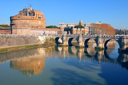 reflection of the Castle Sant'Angelo and the bridge Sant'Angelo in the river Tiber, Rome, Italyのeditorial素材