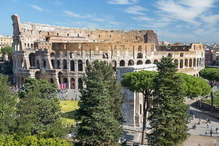 aerial view of the Coliseum or Flavian Amphitheatre (Amphitheatrum Flavium or Colosseo) and Arch of Constantine, Rome, Italyの写真素材