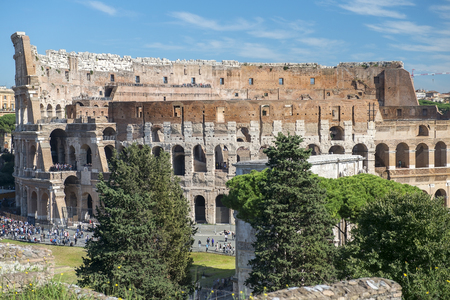 aerial view of the Coliseum or Flavian Amphitheatre (Amphitheatrum Flavium or Colosseo) and Arch of Constantine, Rome, Italyの写真素材