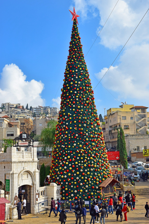 NAZARETH, ISRAEL - DECEMBER 23: People celebrate the Christmas, near the Greek Orthodox Church of the Annunciation in Nazareth, Israel, december 21, 2018のeditorial素材