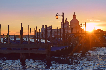 cityscape with gondolas, Venice at sunsetの写真素材