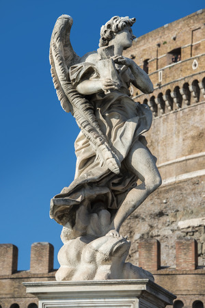 Angel with the Superscription, one of the ten Gian Lorenzo Bernini angels on the Sant'Angelo bridge, Rome, Italyの写真素材