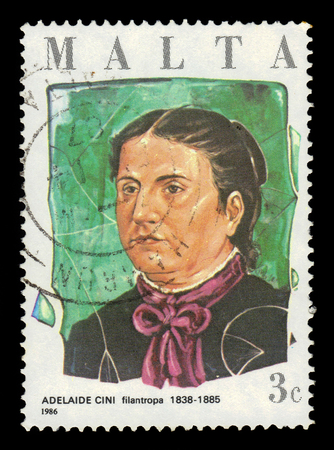 Malta - CIRCA 1986: A stamp printed in Malta shows portrait Adelaide Cini, maltese philanthropist, circa 1986のeditorial素材