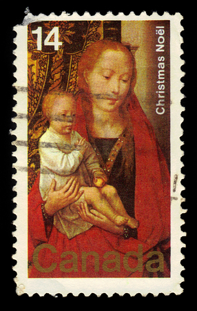 CANADA - CIRCA 1978: A stamp printed in Canada shows painting by Hans Memling, "The Virgin and Child with St. Anthony Abbot and a Donor" 1472, circa 1978のeditorial素材