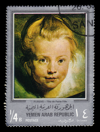 Yemen - CIRCA 1968: stamp printed in Yemen Arab Republic, shows head of a girl, paintings by Rubens, silver frame, circa 1968のeditorial素材