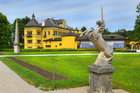 Salzburg, Austria - May 25, 2019 : sculpture of a unicorn in the park on the background of the Hellbrunn Palace, summer residence of the Archbishop of Salzburgのeditorial素材