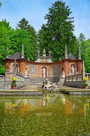 Salzburg, Austria - May 25, 2019 : trick fountains and sculptures at the  Public Gardens of Hellbrunn Palace (Schloss Hellbrunn) in Salzburgのeditorial素材