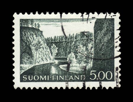 FINLAND - CIRCA 1964: stamp printed by Finland, shows Ristikallio near Avennonjoki in Kuusamo, Oulanka National Park on the bank of the River Aventojoki, circa 1964のeditorial素材