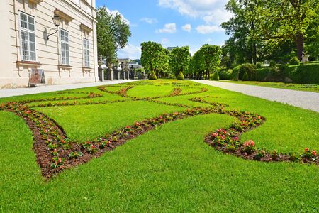 Salzburg, Austria - May 23, 2018 : magnificent landscaped park - Mirabell gardens and Mirabell Palace or Schloss Mirabell in Salzburgのeditorial素材