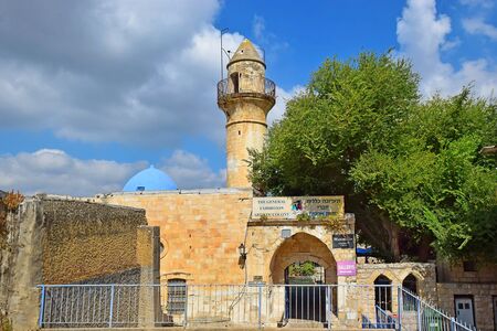 Safed, Upper Galilee, Israel - July 19, 2019: minoret of old turkish mosque, walk through the Old Town of Safed, center of Kabbalah and jewish mysticism in Upper Galileeのeditorial素材