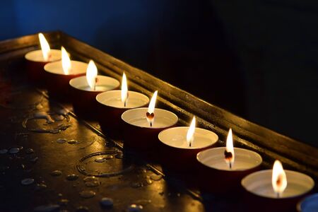 burning memorial candlesの写真素材